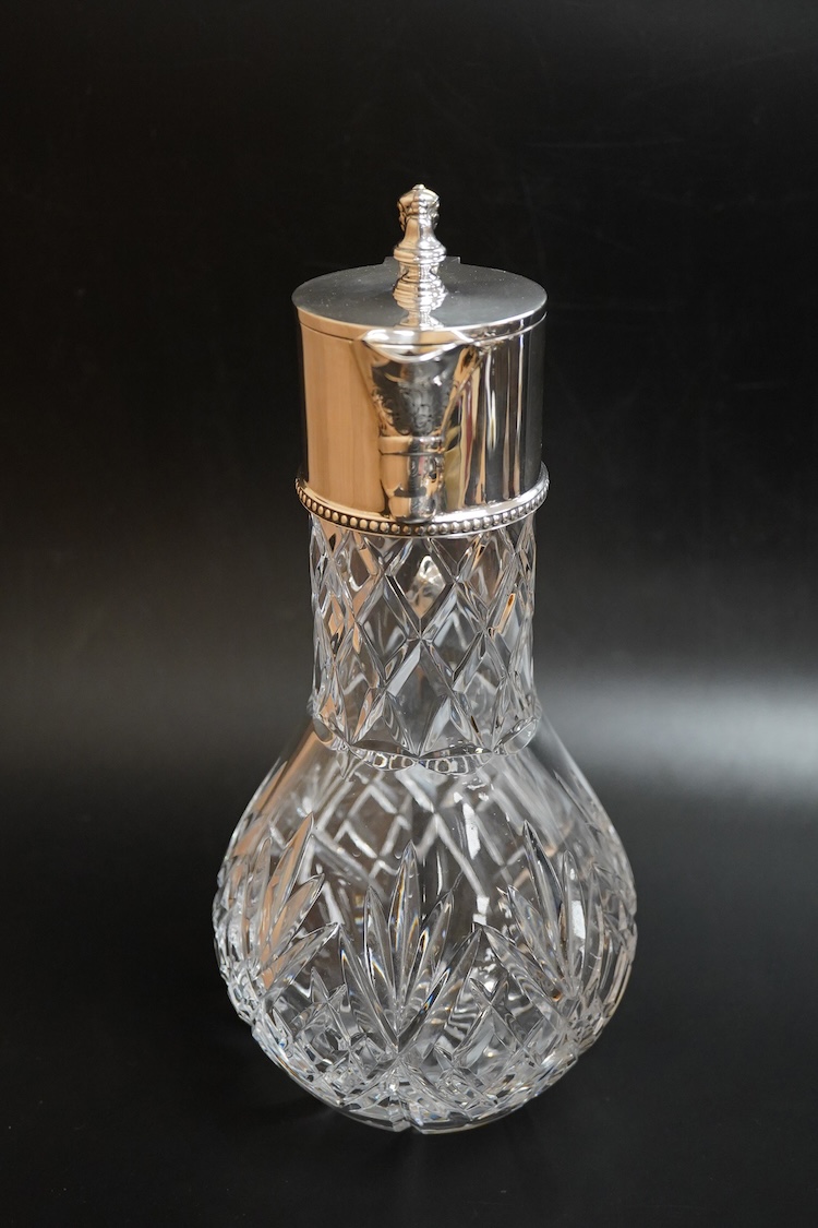 An Elizabeth II silver mounted cut glass claret jug, by J. Bros, Sheffield, 1978, height 28.5cm.